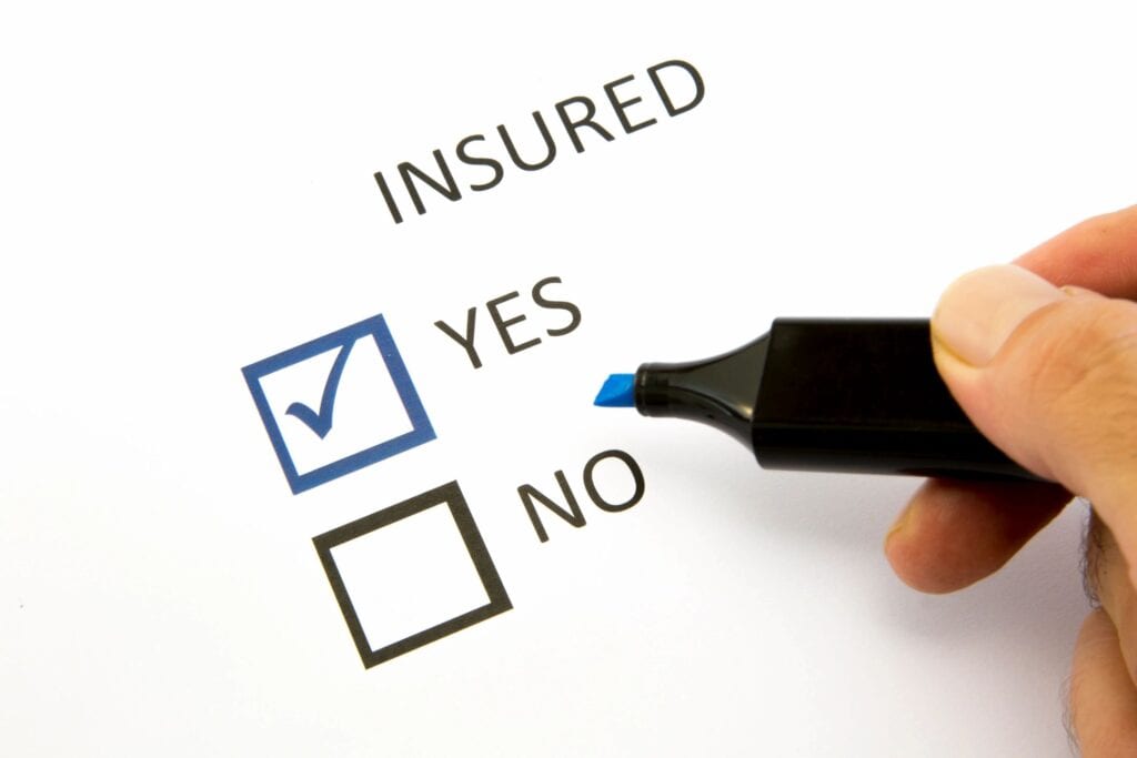 An Insured White paper With Yes and No Marking